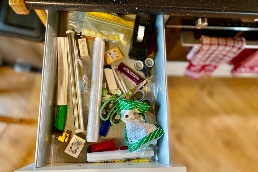 Kitchen drawer with all kind of small things in it